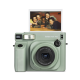 Front view of Fujifilm Instax WIDE 400 instant camera in sage green with wide-format instant print displayed