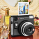 Instax SQ40 instant camera placed beside luxury perfume bottles with printed square photo display for stylish lifestyle photography.