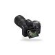 Nikon D850 DSLR rear view with tilting LCD display and 24-120mm lens